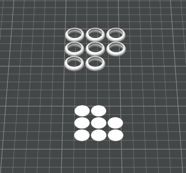 3D-printable discbound notebook discs and centre pieces arranged in Bambu Studio